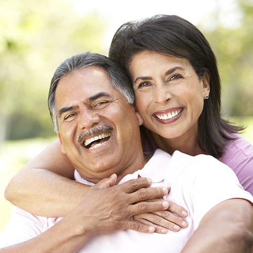 mature couple satisfied and happy after using a device for sleep apnea in Brampton