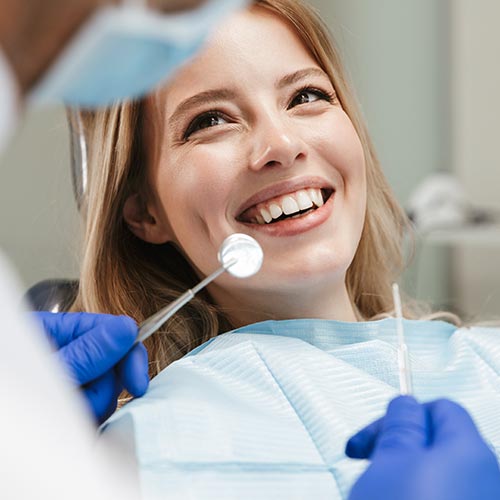 woman at a dental exam in Brampton